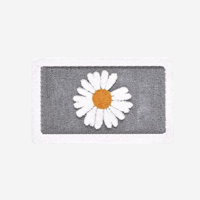 Saugfähige Badematte mit Gänseblümchen-Motiv