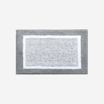 Graue Fußmatte für den Eingang