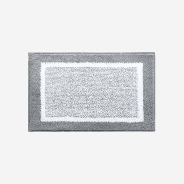 Graue Fußmatte für den Eingang