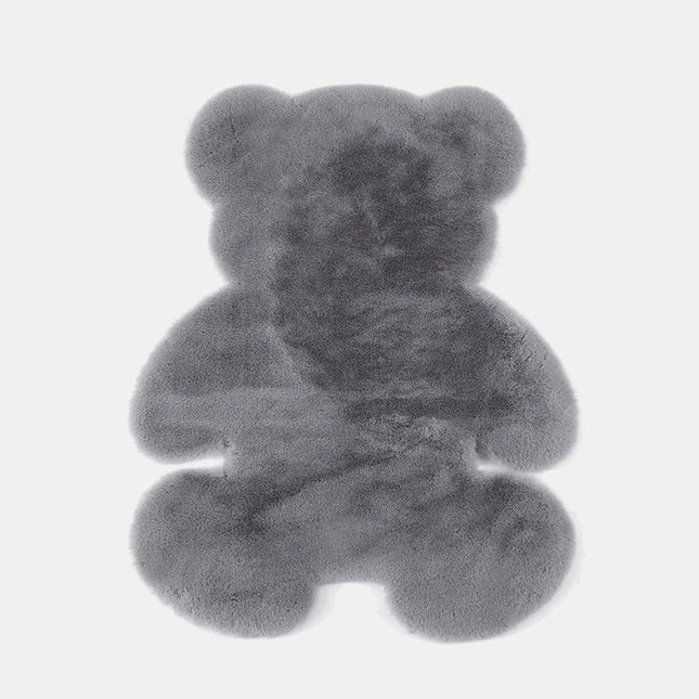 Dunkelgrauer Teppich in Bärenform