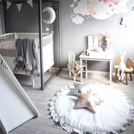 Weißer runder Teppich fürs Babyzimmer