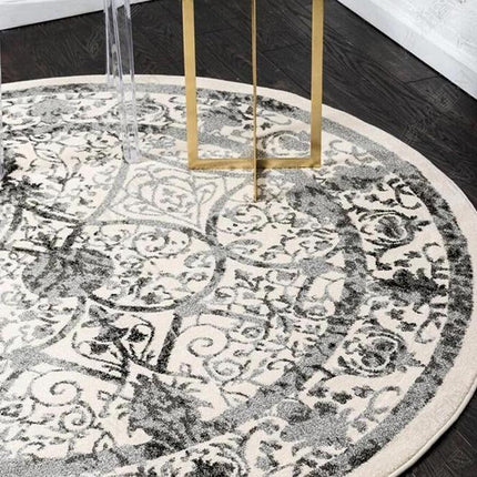 Runder Vintage Teppich mit Blumenmuster